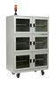 Dehumidification and storage cabinets